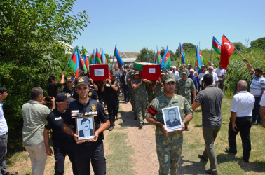 31 il öncə itkin düşən ana və övladının nəşinin qalıqları Saatlıda dəfn olunub